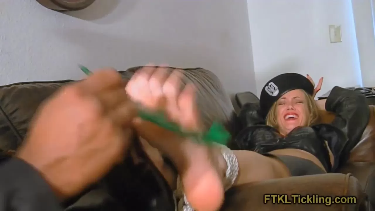 FTKL’sTicklingFantasies – The Crimson Police Files! Pt. 17 Big Feet Can't.webp