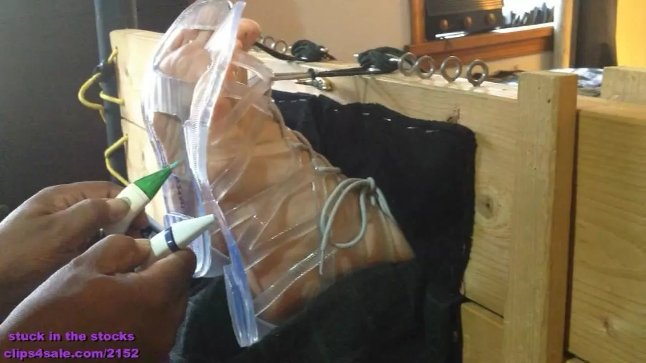 StuckInTheStocks - Athena's Toes Locked In The Tickle Shoes!.0007 - 00-05-00.webp